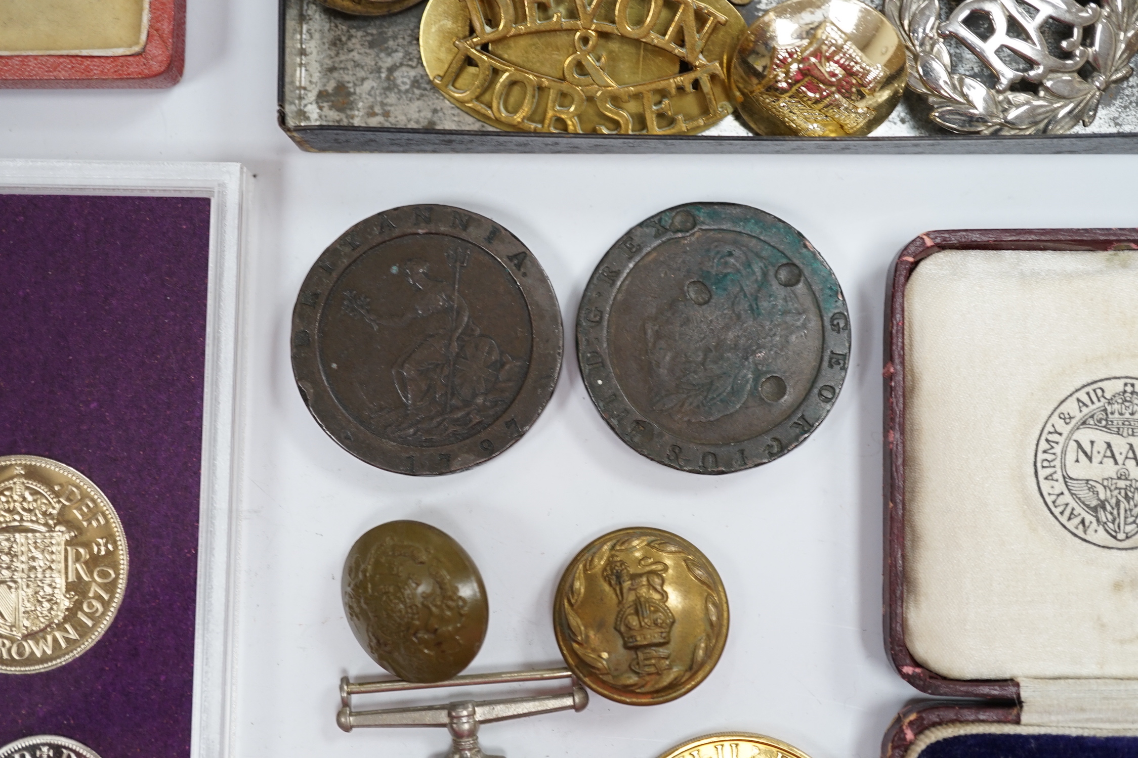 A collection of medals and coins including; an original card Air Ministry box containing a 1939-45 star and a 1939-45 medal in their greaseproof envelopes, together with a further Defence medal, a 1939-45 medal, a cased